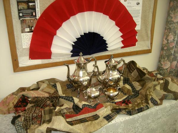 Silver Tea Set on Civil War quilt at reception 4-11-15.jpg